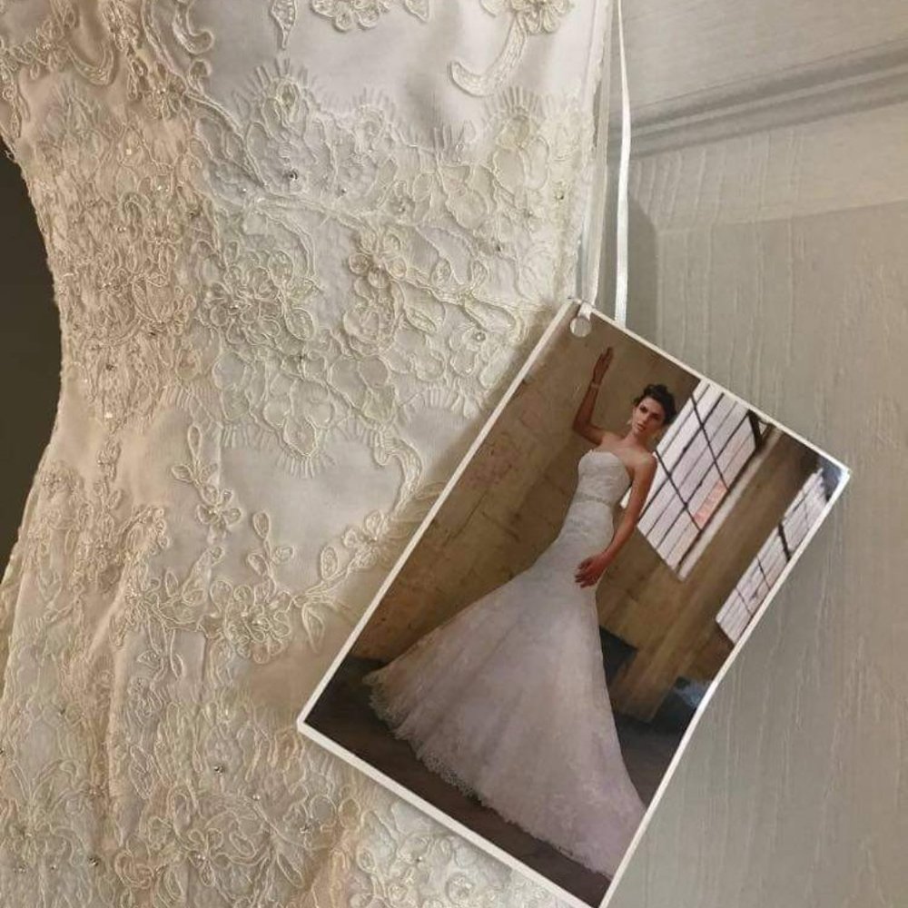 Brand new (tag still on) Essence of Australia wedding dress